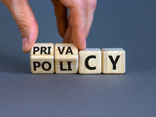 Notebooklm privacy update illustrated with wooden blocks spelling 'privacy policy,' symbolizing data protection.